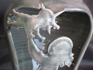 Mary tossing baby Jesus in air